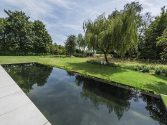 Tuinen Joos BVBA Étang miroir avec  vue sur l’horizon