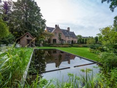 Cools Tuinaanleg bvba Un étang de natation attrayant